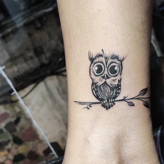 cute owl tattoo design idea female ankle