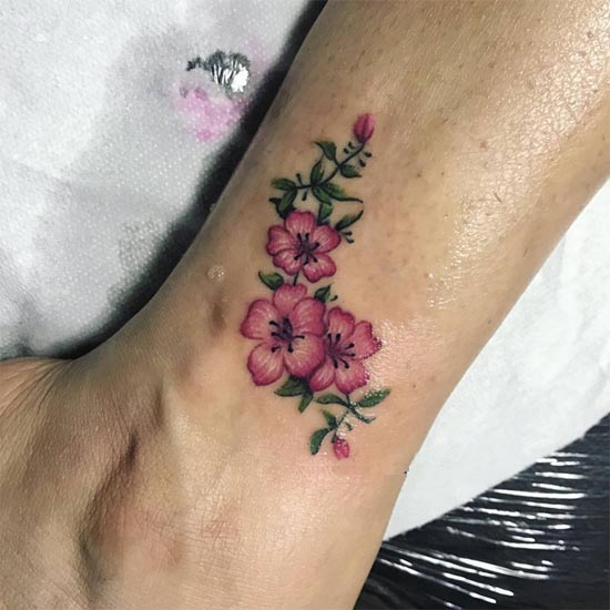 lily flower tattoo color female outer ankle