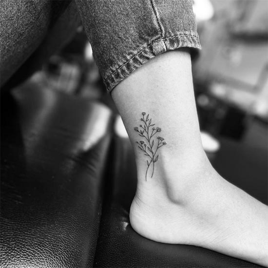 mustard flowers simple tattoo design minimalist girl outer side ankle