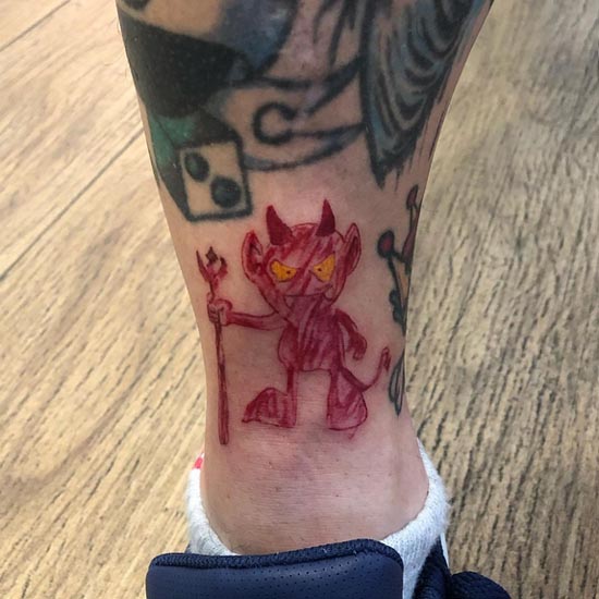 old school red devil tattoo design man back of ankle