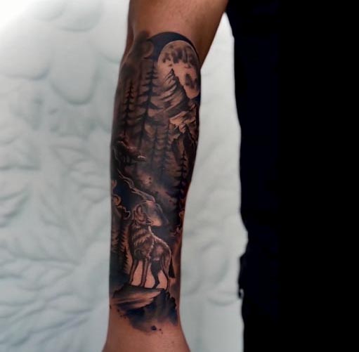 howling wolf at nightfall in forrest tattoo man right half arm sleeve