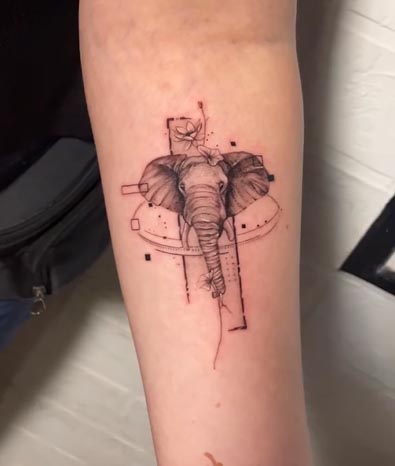 elephant trunk tattoo design geometric fine line woman inner arm forearm