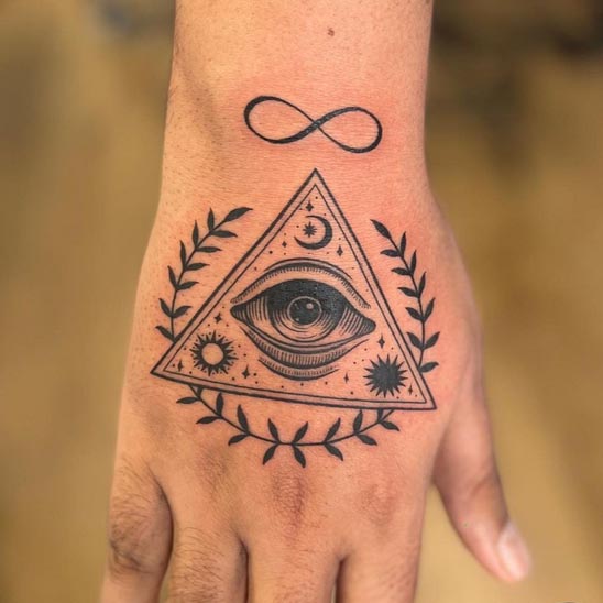 eye in triangle with leaves infinity tattoo design male lower arm hand