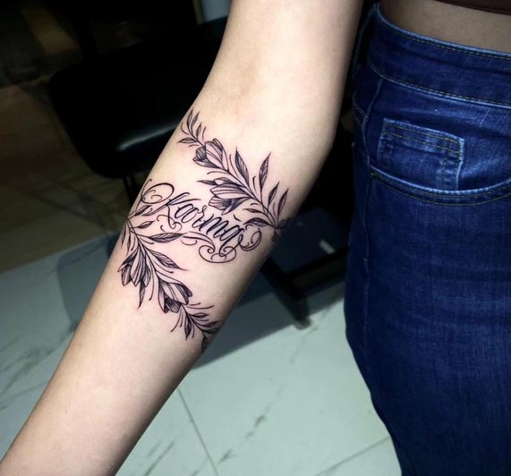 floral leaves wrap around forearm with work karma woman arm