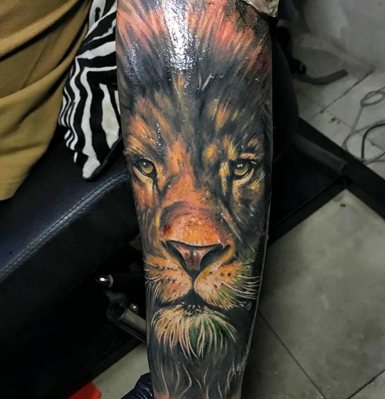 lion face tattoo design man arm forearm half sleeve