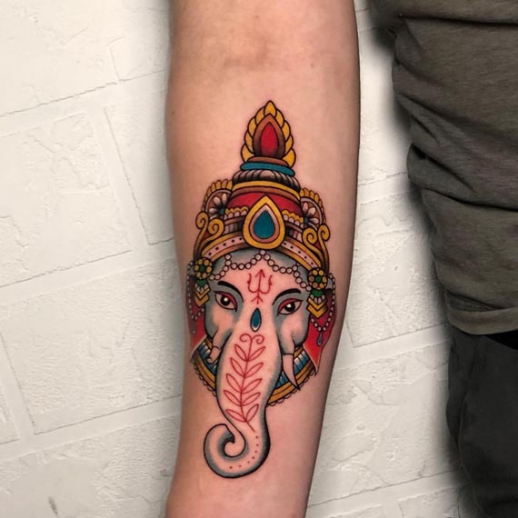 new school ganesha unique tattoo design color male inner arm forearm