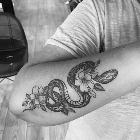 snake cherry blossom best tattoo design guy back arm black and grey