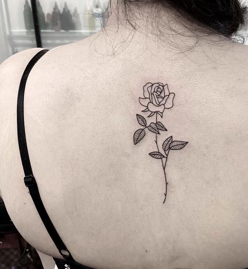 cute rose tattoo design linework woman back