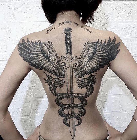 doctors symbol wings sword dragons tattoo woman full back