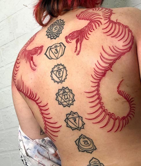 nice snake skeleton red color tattoo design female full back