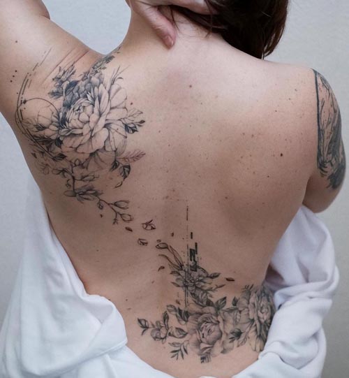 unique floral tattoo design woman full back black and grey