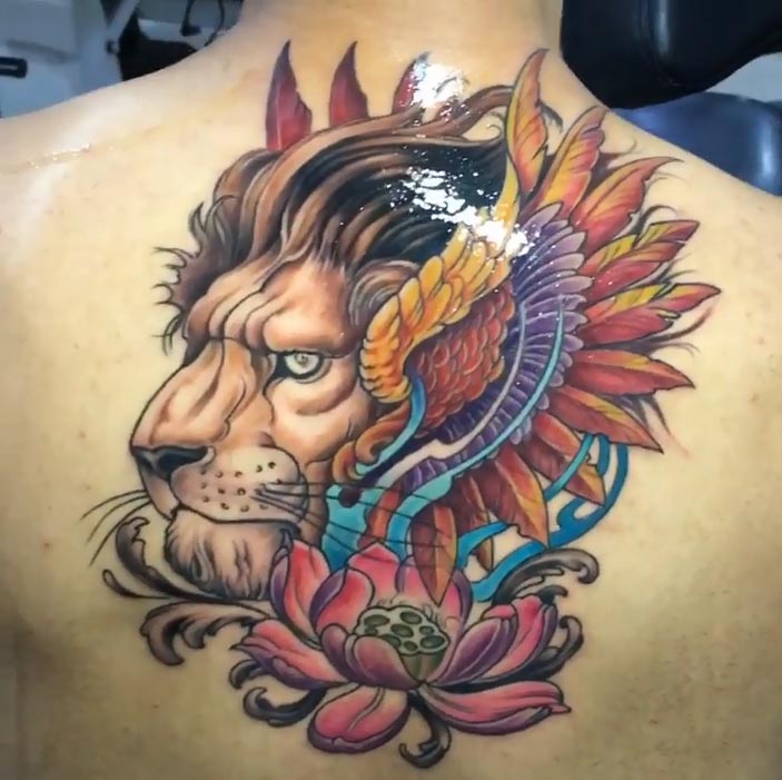 lion with flowers tattoo design male back