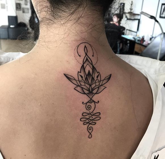 lotus unalome tattoo idea female back