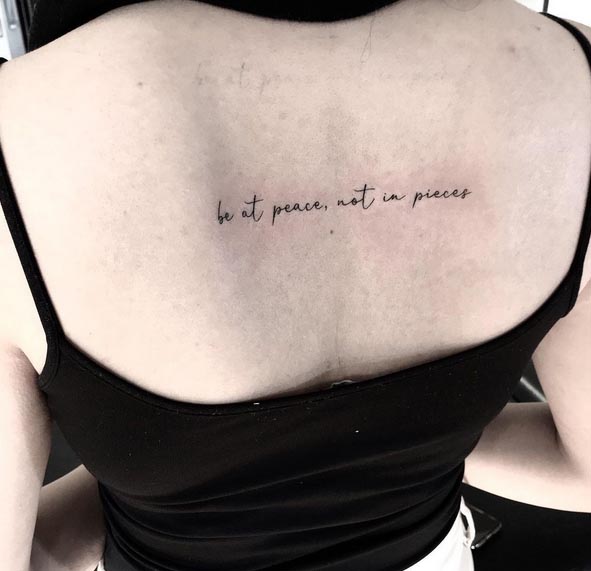 quote be at peace not in pieces tattoo minimalist female back