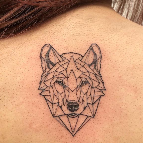 small wolf geometric linework tattoo design female back