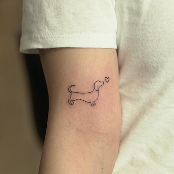 dog heart small tattoo design outline girl lower bicep