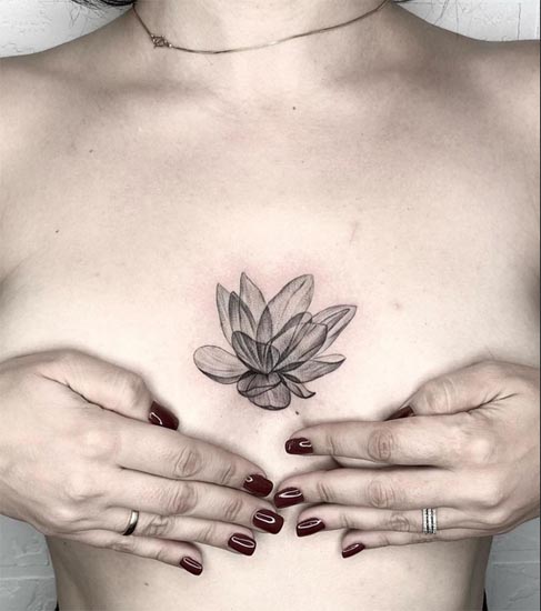 lotus flower xray small tattoo design female between breast minimalist