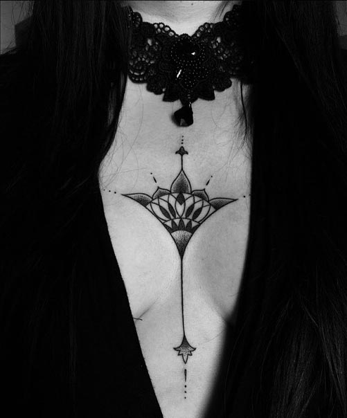 ornamental tattoo idea dotwork female middle breast