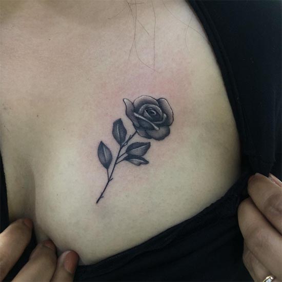 rose small tattoo black and grey girl above right breast