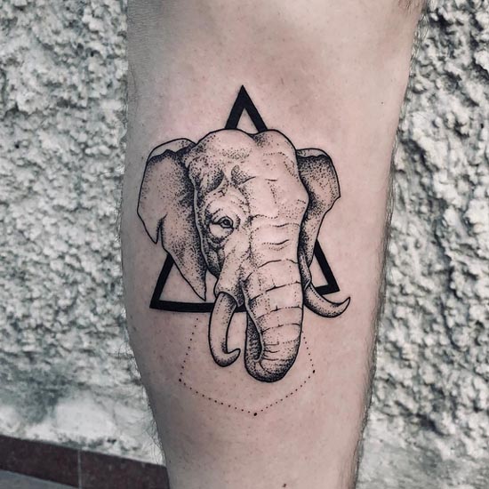 geometric elephant head tattoo dotwork on hand boy inner side calf