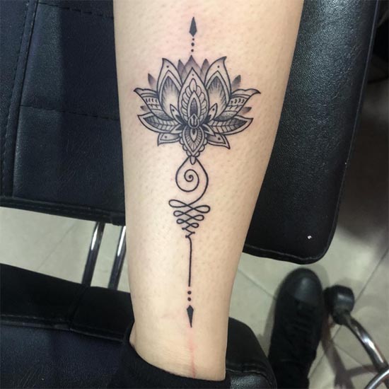 lotus flower mandala unalome tattoo design lady lower calf