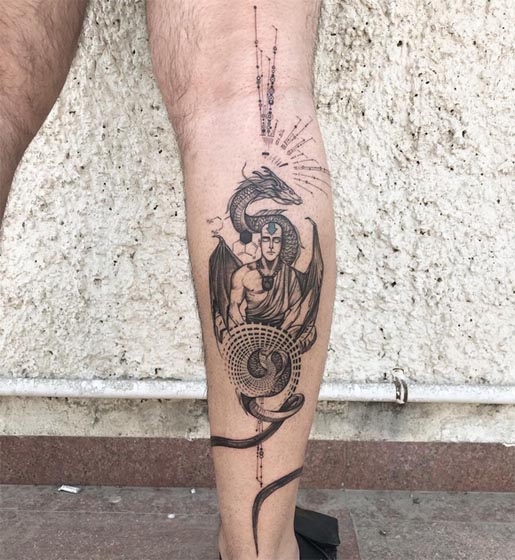 meditating man dragon with geometic pattern tattoo man calf vertical