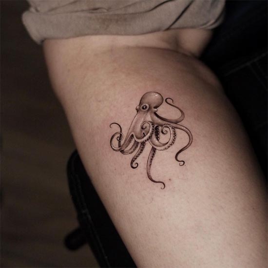 octupus black and grey small easy tattoo design female outer calf