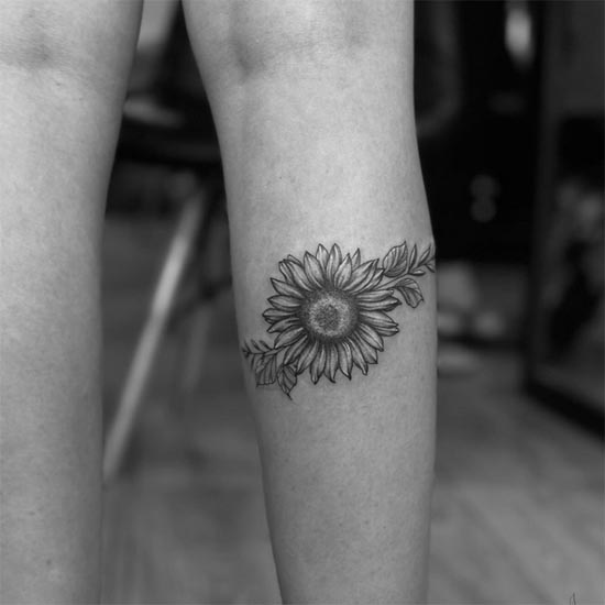 sunflower tattoo design woman leg calf