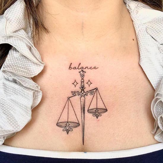 balance tattoo design female chest