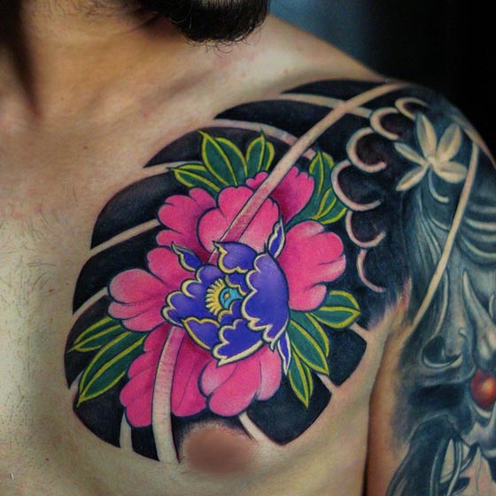 color flower tattoo male left half chest