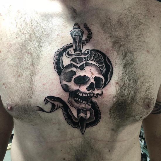 dagger through skull snake in background tattoo design man between chest