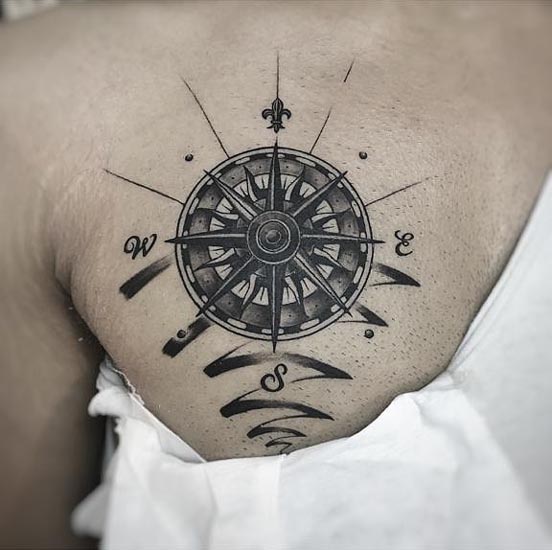 nautical compass tattoo design black and grey male chest