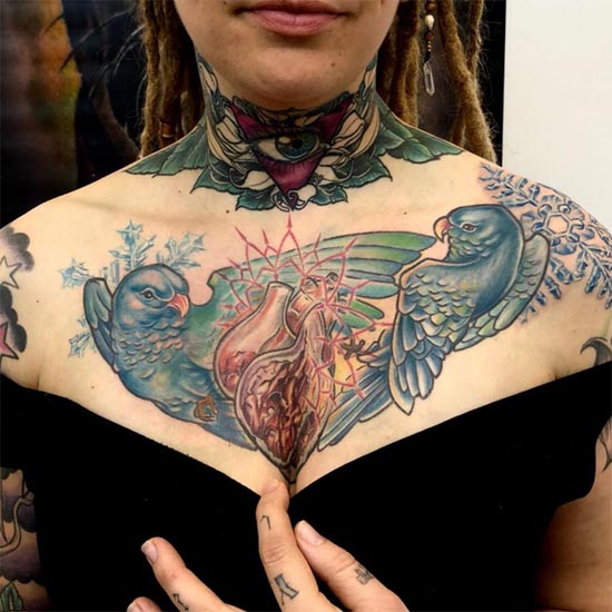 new school parrots snowflakes heart tattoo female full chest color