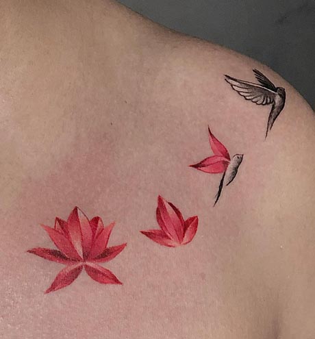 blooming lotus with hummingbird elegant tattoo design woman collarbone