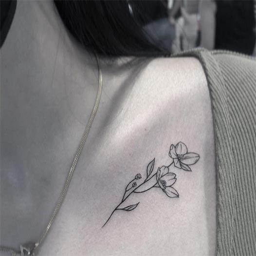 flower tattoo design minimalist girl under collarbone