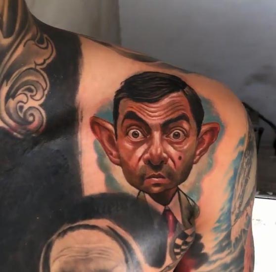 movie character mr bean portrait tattoo idea man collarbone