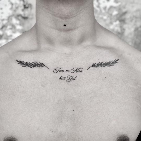 quote fear no man but god with leaf tattoo male double collarbone