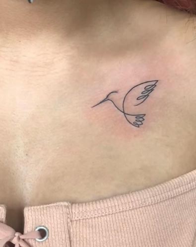 small bird linework tattoo single line girl collarbone