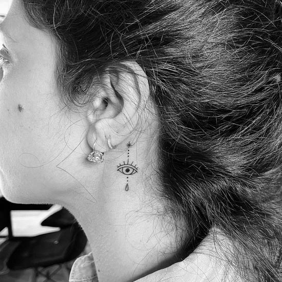 eye tattoo design minimalist small simple lady neck behind ear