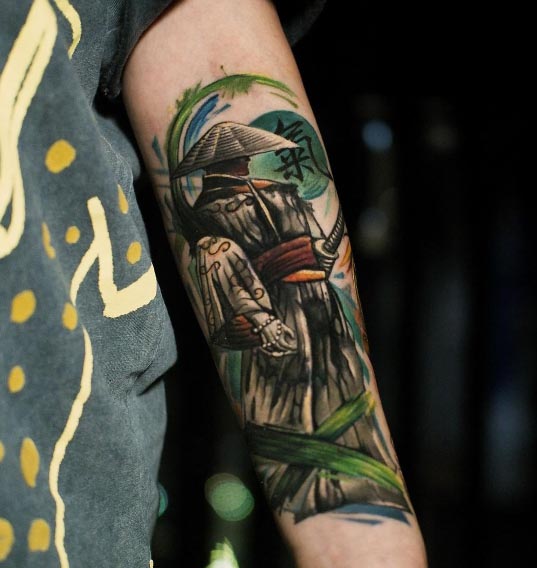 japanese samurai warrior in jungle tattoo design male elbow