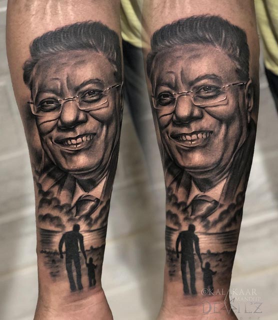 arm father son tattoo