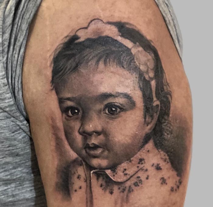 male bicep daughter portrait