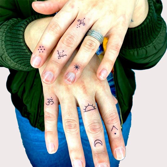 traditional symbols unique tattoos female finger minimal