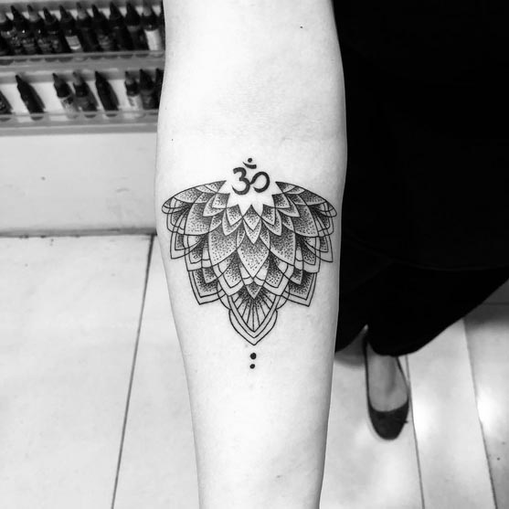 om mandala tattoo design dotwork female right upper forearm