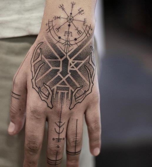 freehand deer horn geometric pattern compass tattoo male hand