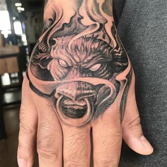 raging bull tattoo idea hand man