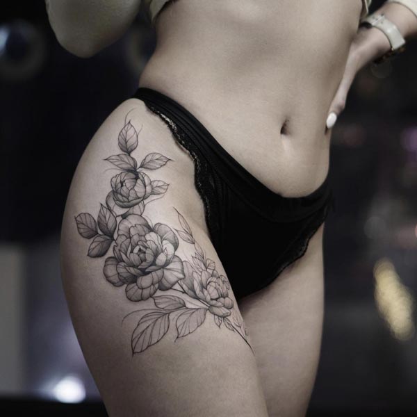 3 peony flowers with leaves elegant tattoo design female hip