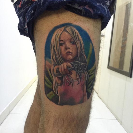 badass little girl holding gun tattoo male leg thigh