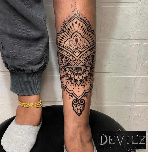 calf tattoo ornamental tattoo