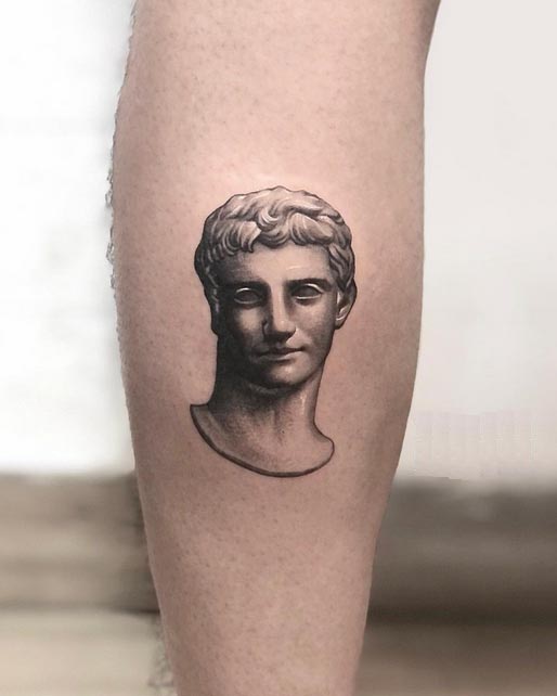 calf tattoo roman sculpture